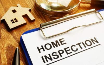 Home Inspection paper on clipboard